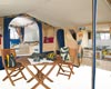 Comfortable seated area inside the cabin. Room for 2 single under 
bed inner tents underneath the beds. Cabin and awning roof liners, 
built-in tent tidy pocket, dedicated wardrobe and toilet compartments