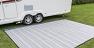 Breathable carpet allows grass to grow