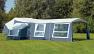 Camp-let Royal in acrylic is shown with optional awning extension, sun canopy and side annexe fitted