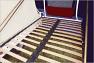 Right hand bed has motorhome quality slatted support for improved comfort