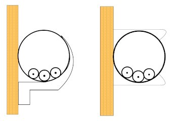 Single core electrical cable in conduit mounted on a wooden wall using 2 different styles of clips